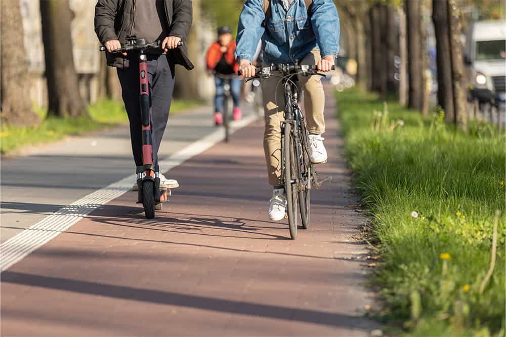 bike-lane-sidewalk-scooter-trees-grass